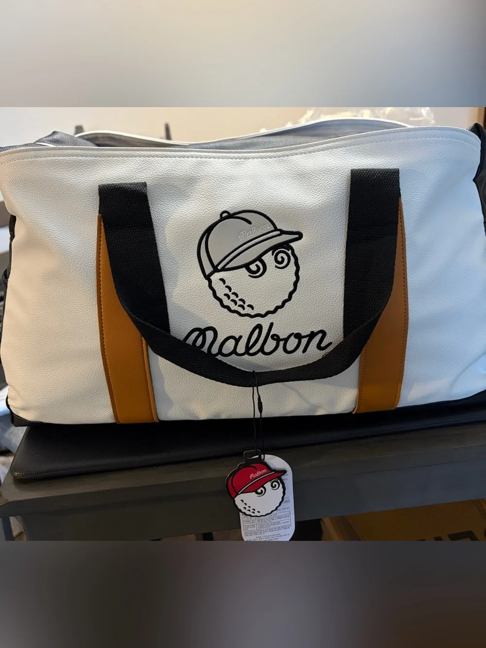Malbon Duffel Bag Black, White, Brown.